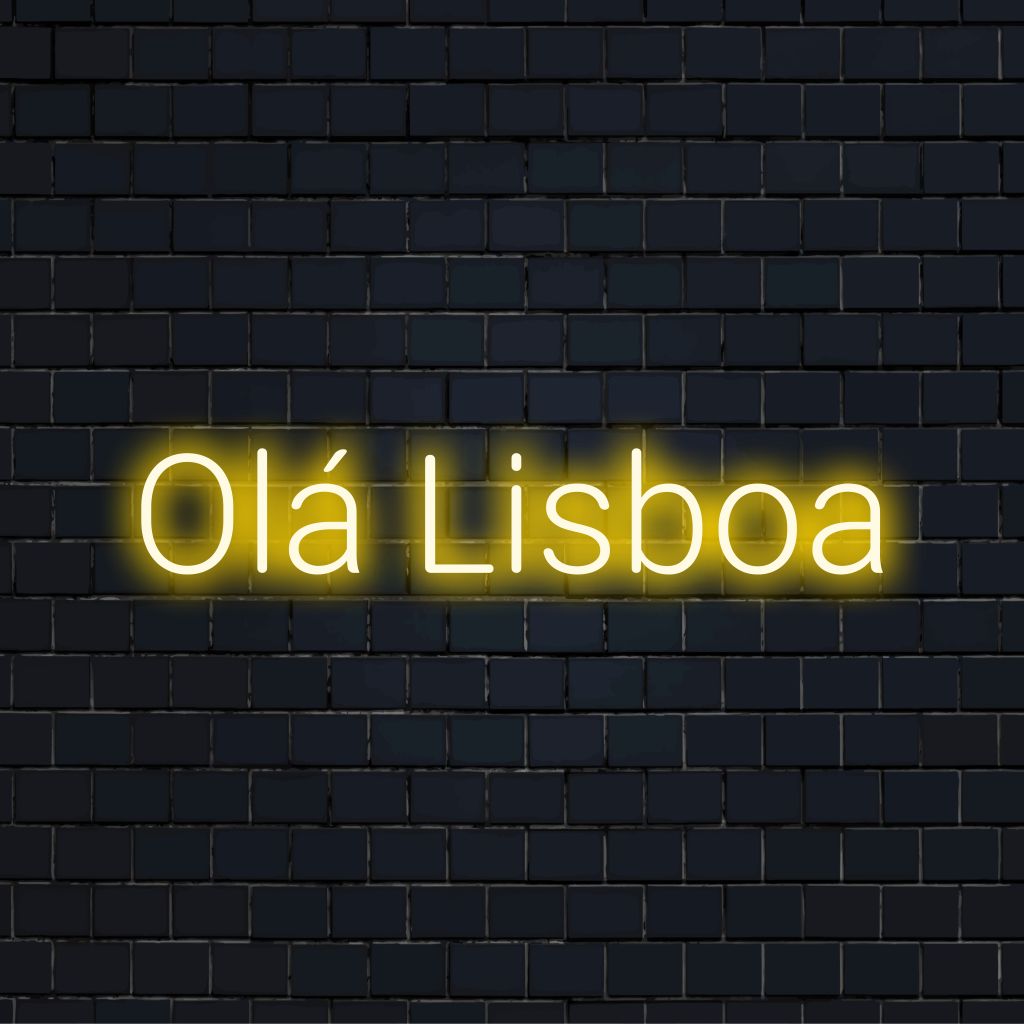 Ola Lisboa Neon Light with bright neon lettering on black brick background