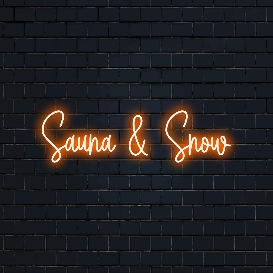 Sauna Snow Neon Sign, glowing lettering on dark brick wall