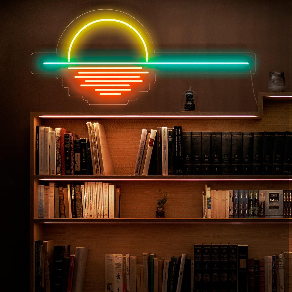 Przykuwający uwagę neon przedstawiający żywą scenę zachodu słońca.