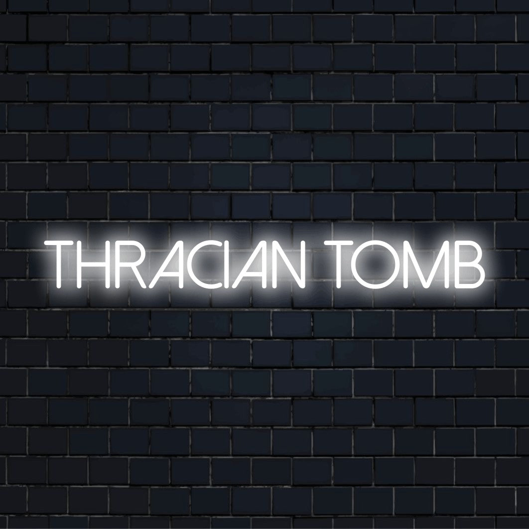 Thracian Tomb Neon Sign, glowing lettering on black brick background