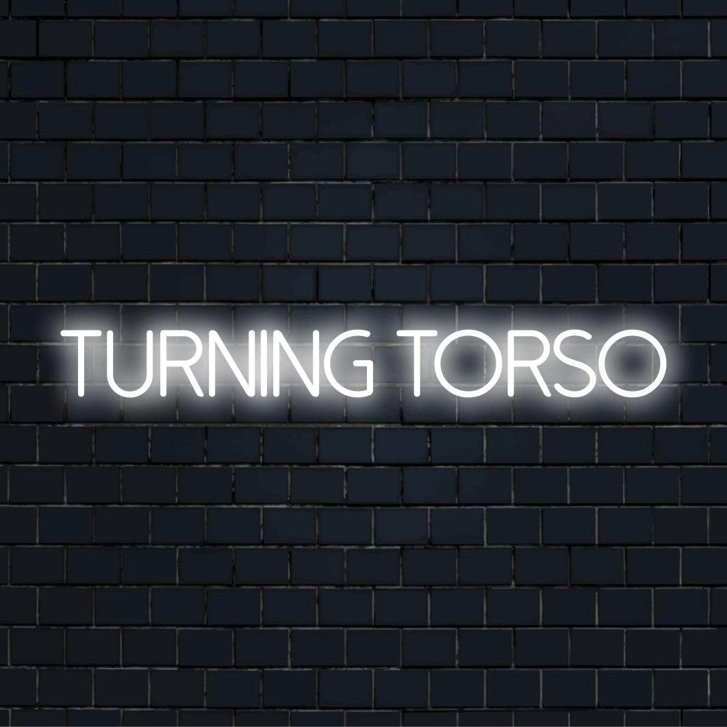 Turning Torso Neon Light with bright neon glow against brick backdrop