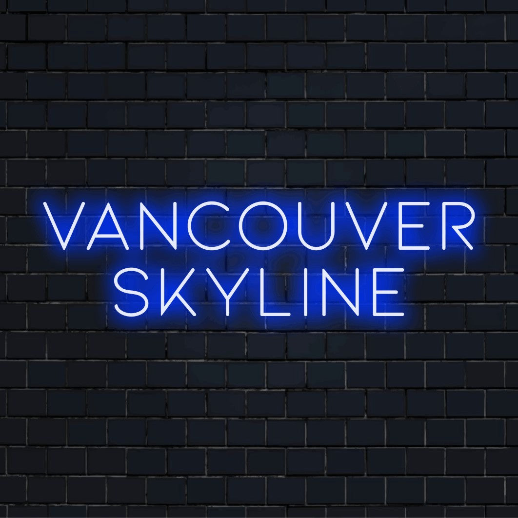 Vancouver Skyline Neon Sign, glowing neon text on dark brick wall