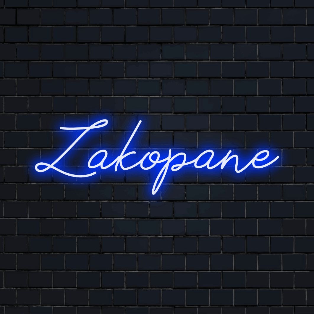 Zakopane Neon Light with soft neon glow on dark brick background