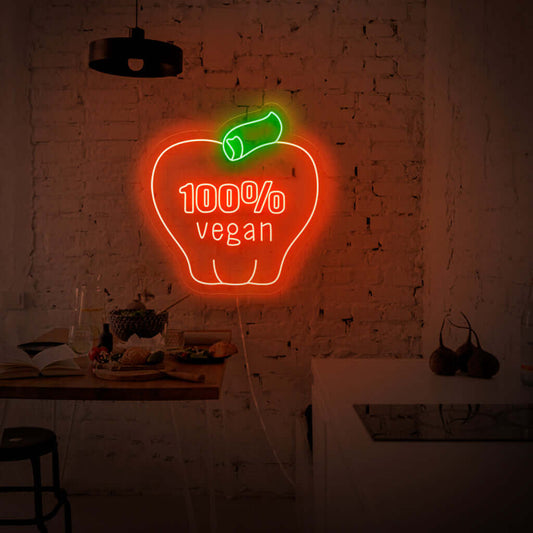 "100% Vegan With Apple Neon Sign" features a vibrant and eco-friendly design, proudly showcasing the apple symbol as a testament to your commitment to a plant-based lifestyle.
