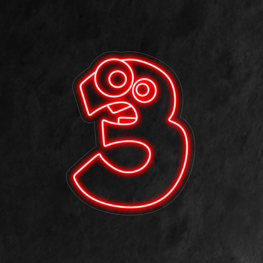 "3rd Birthday Neon Sign" features a cute and comical number 3, with caricatured eyes and teeth, adding a delightful touch to a child's third birthday celebration.