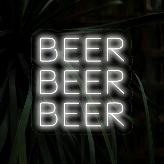 Vibrant LED neon sign with the words Beer Beer Beer radiant in classic script; perfect for home bar wall decor.