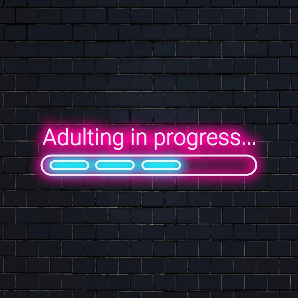 Custom LED neon sign with 'Adulting In Progress...' text in bright white, perfect neon light decor for modern spaces.