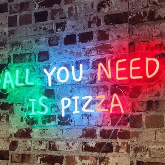 "All You Need Is Pizza Neon Sign" - A playful neon light celebrating the love for pizza, adding a mouthwatering and fun vibe to your pizzeria or kitchen decor.