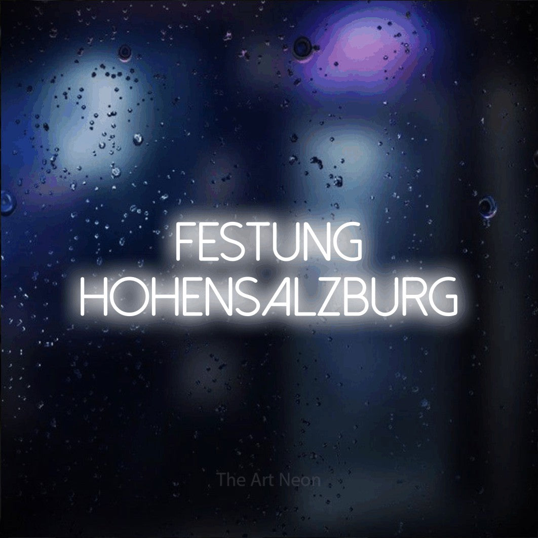 LED neon sign reading “FESTUNG HOHENSALZBURG”, arranged in 2 lines.