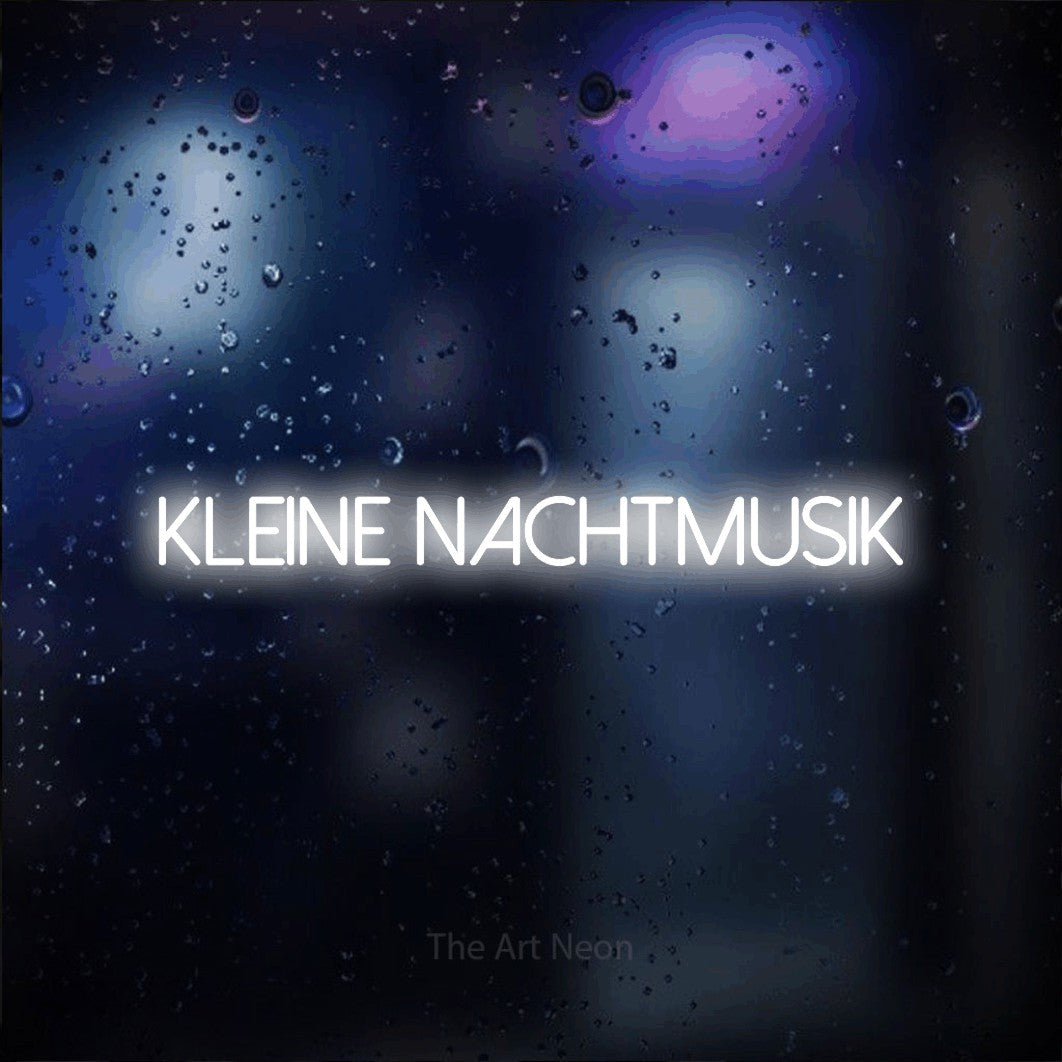 LED neon sign reading “KLEINE NACHTMUSIK”, arranged in a single line.