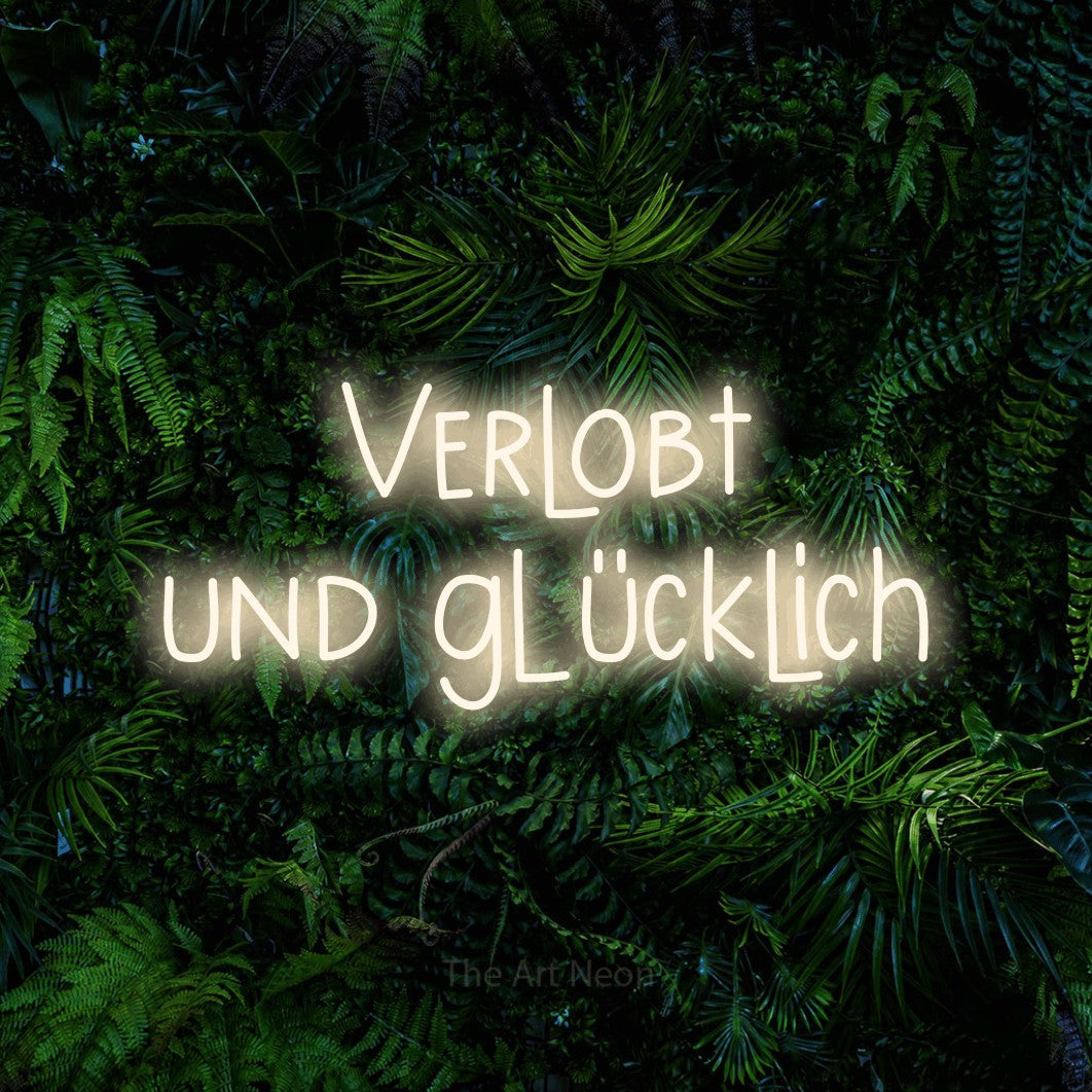 LED neon sign reading “Verlobt und glücklich”, arranged in 2 lines.