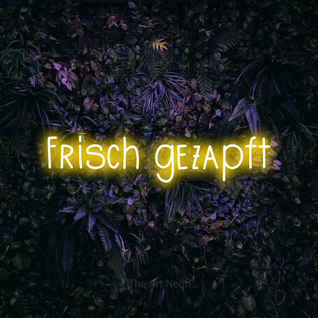 LED neon sign reading “Frisch gezapft”, arranged in a single line.