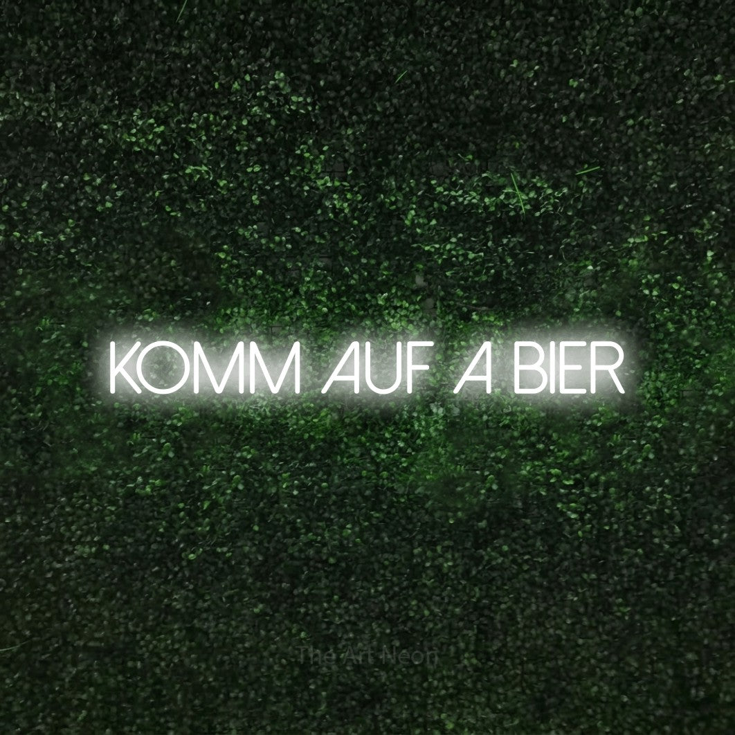 LED neon sign reading “KOMM auf a Bier”, arranged in a single line.