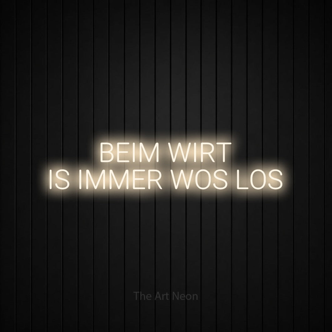 LED neon sign reading “BEIM WIRT IS IMMER WOS LOS”, arranged in 2 lines.