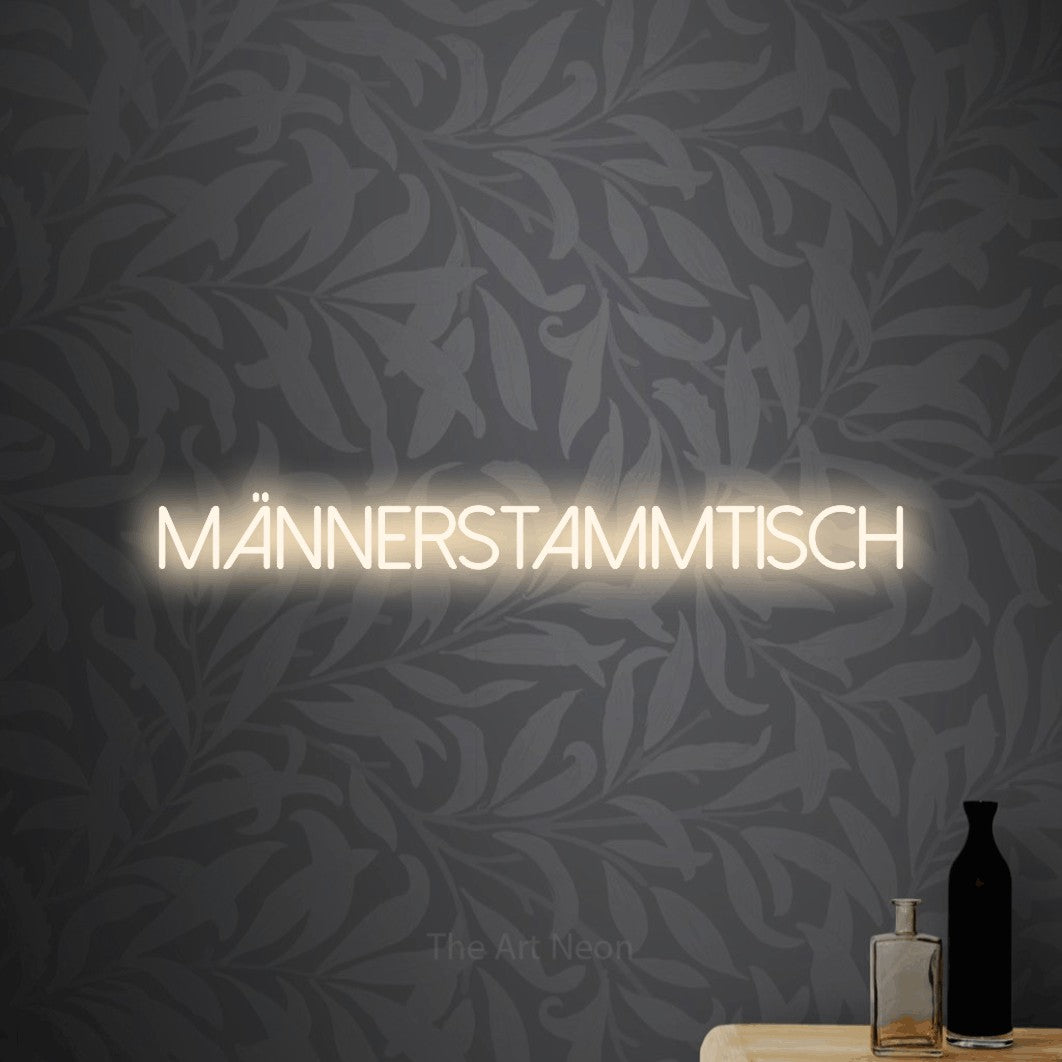 LED neon sign reading “männerstammtisch”, arranged in a single line.