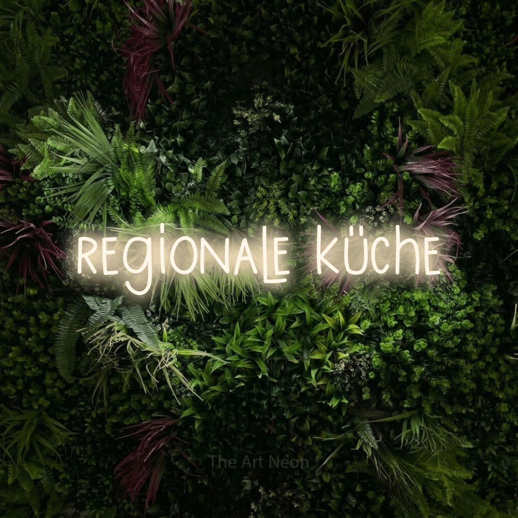 LED neon sign reading “regionale küche”, arranged in a single line.