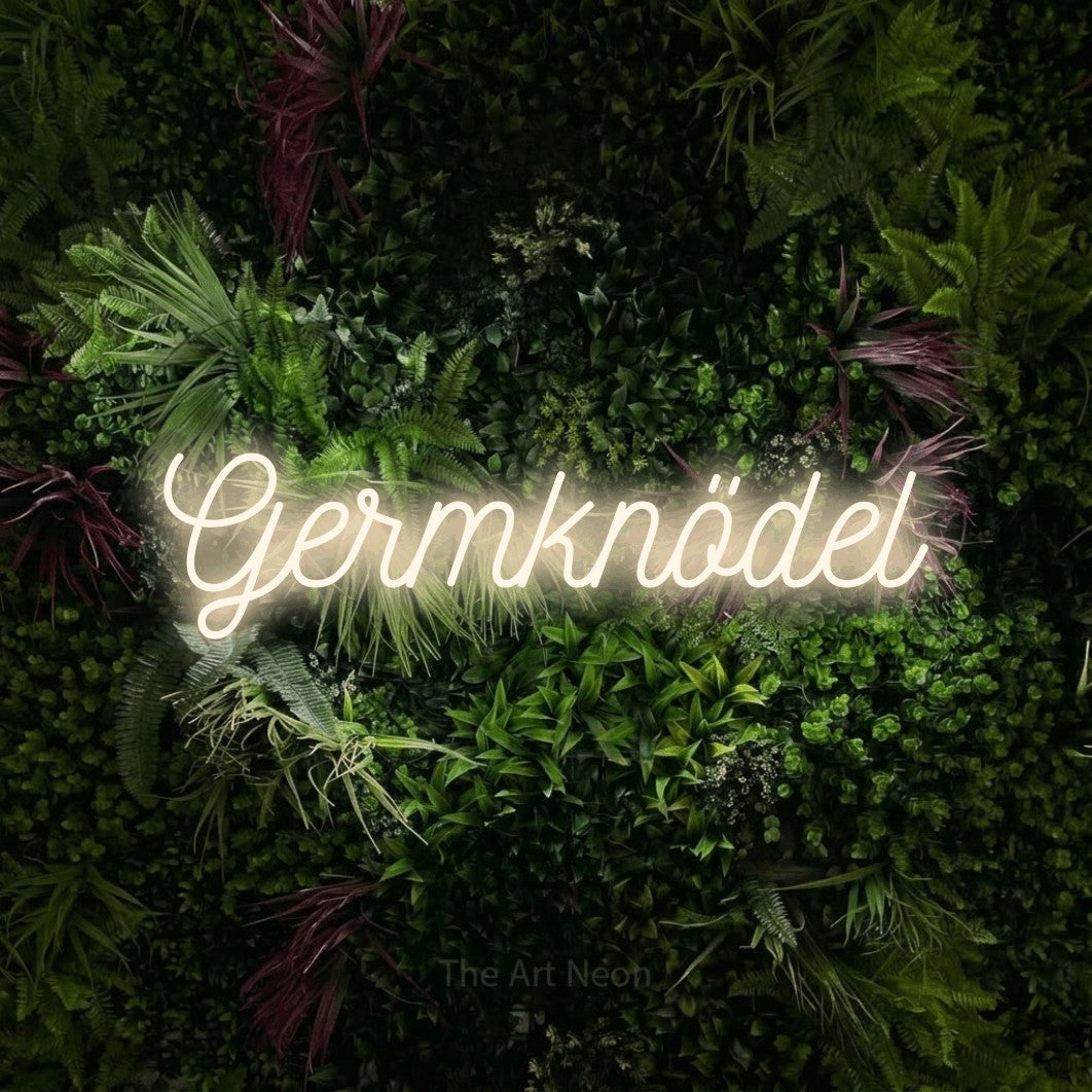 LED neon sign reading “Germknödel”, arranged in a single line.