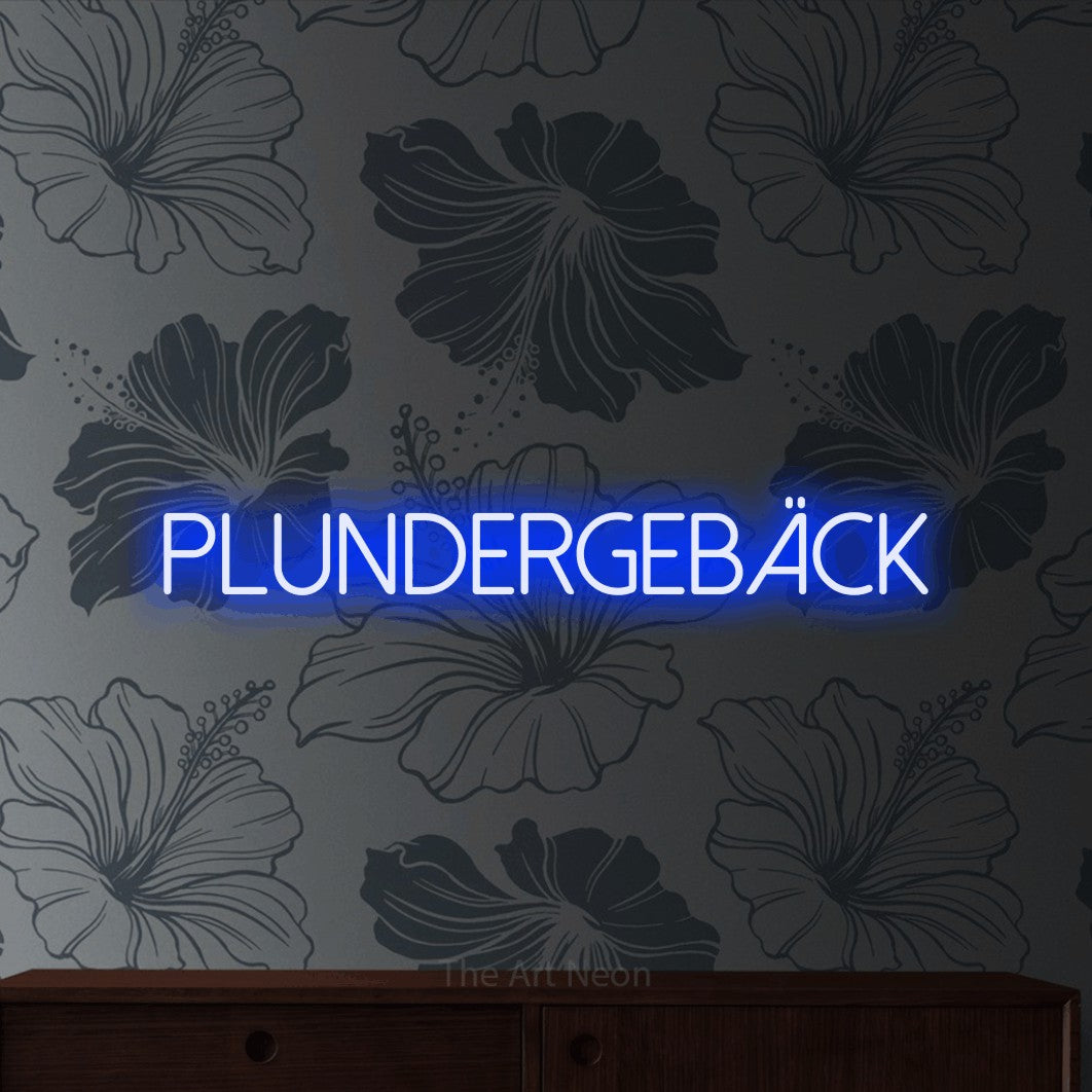 LED neon sign reading “PLUNDERGEBÄCK”, arranged in a single line.