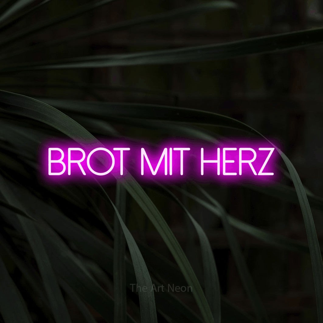 LED neon sign reading “Brot mit Herz”, arranged in a single line.