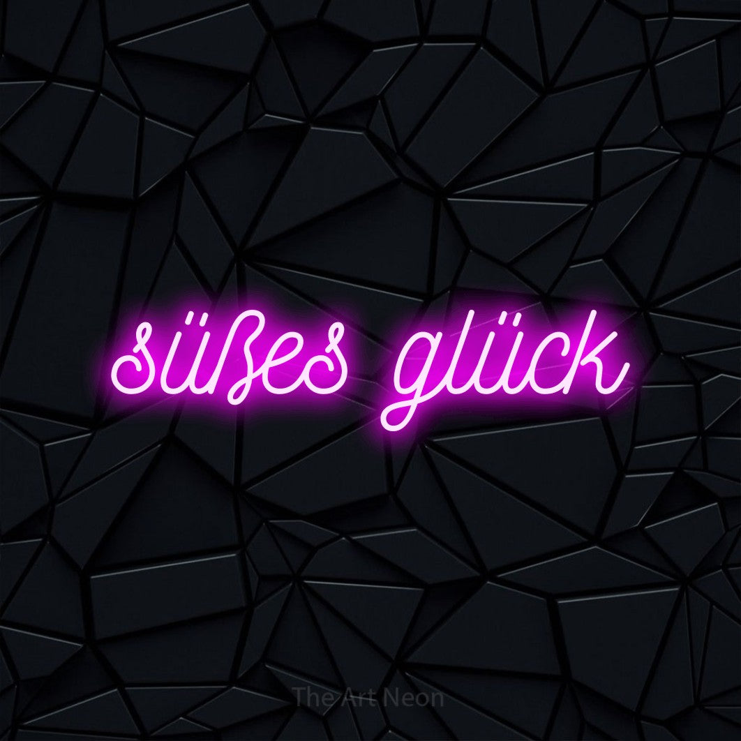 LED neon sign reading “süßes glück”, arranged in a single line.