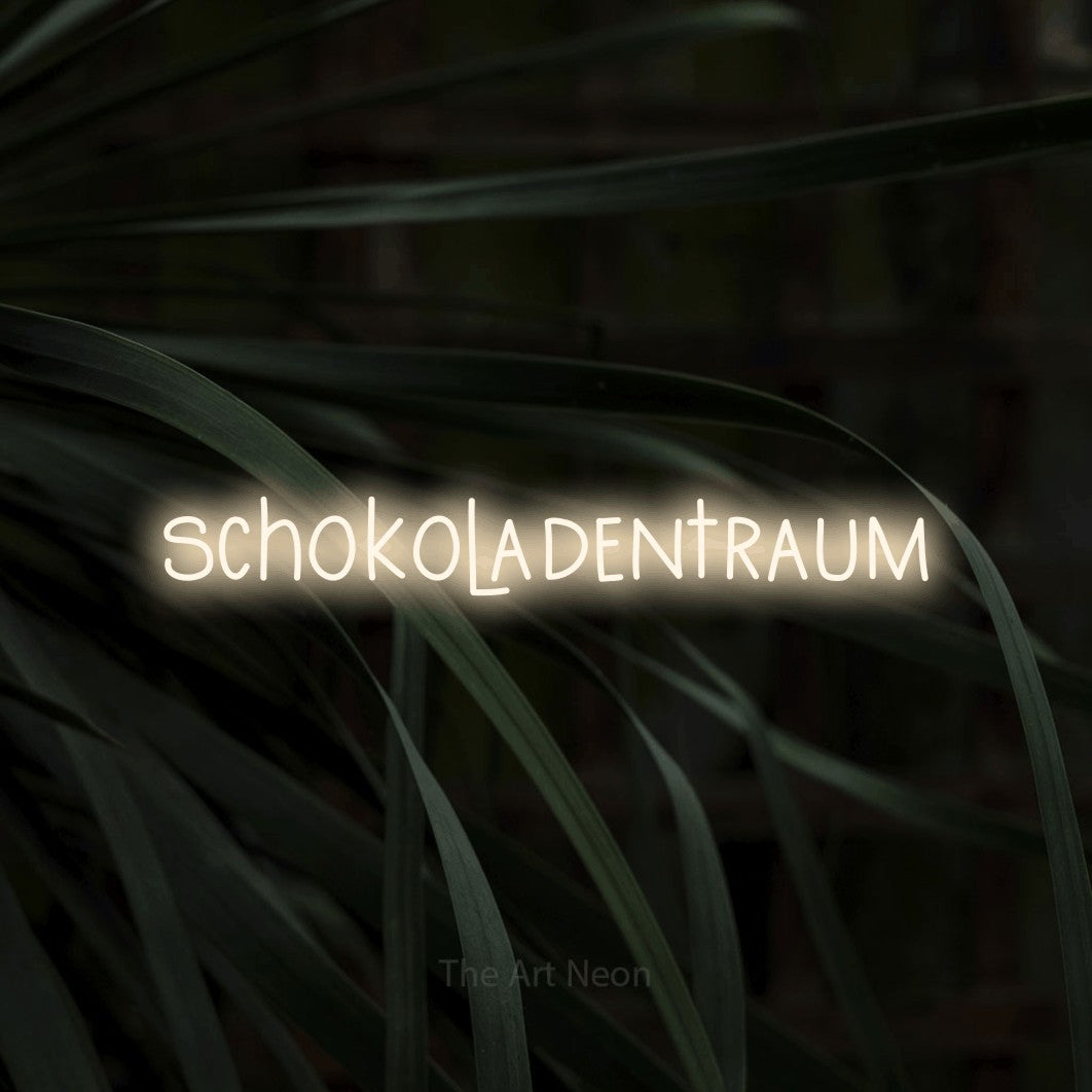 LED neon sign reading “schokoladentraum”, arranged in a single line.