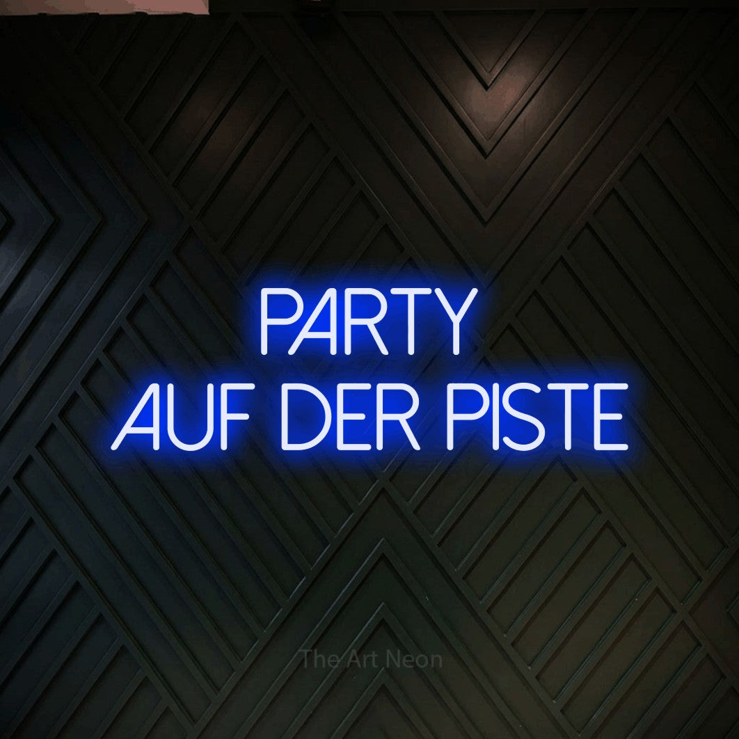 LED neon sign reading “party auf der piste”, arranged in 2 lines.