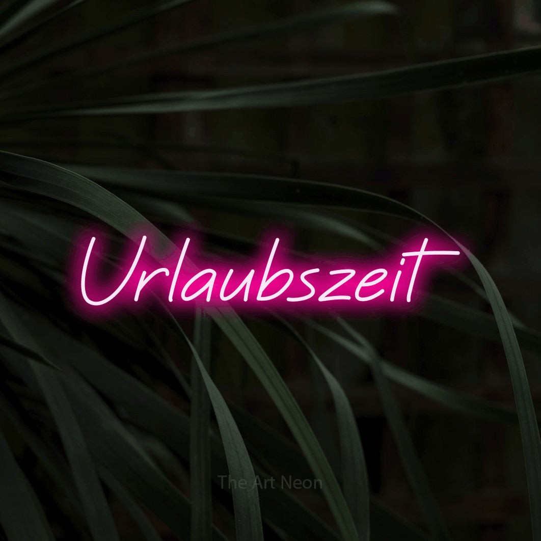 LED neon sign reading “Urlaubszeit”, arranged in a single line.