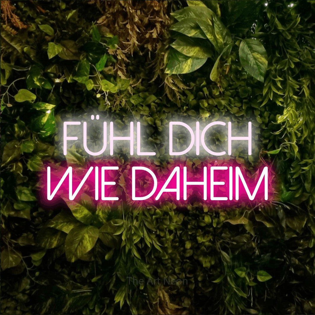 LED neon sign reading “Fühl dich wie DAHEIM”, arranged in 2 lines.