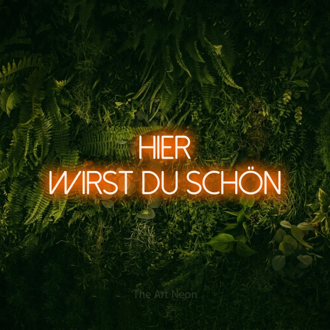 LED neon sign reading “hier wirst du schön”, arranged in 2 lines.