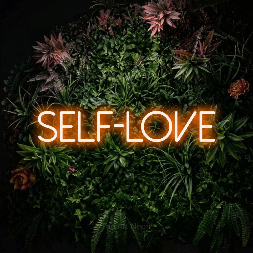 LED neon sign reading “Self-Love”, arranged in a single line.