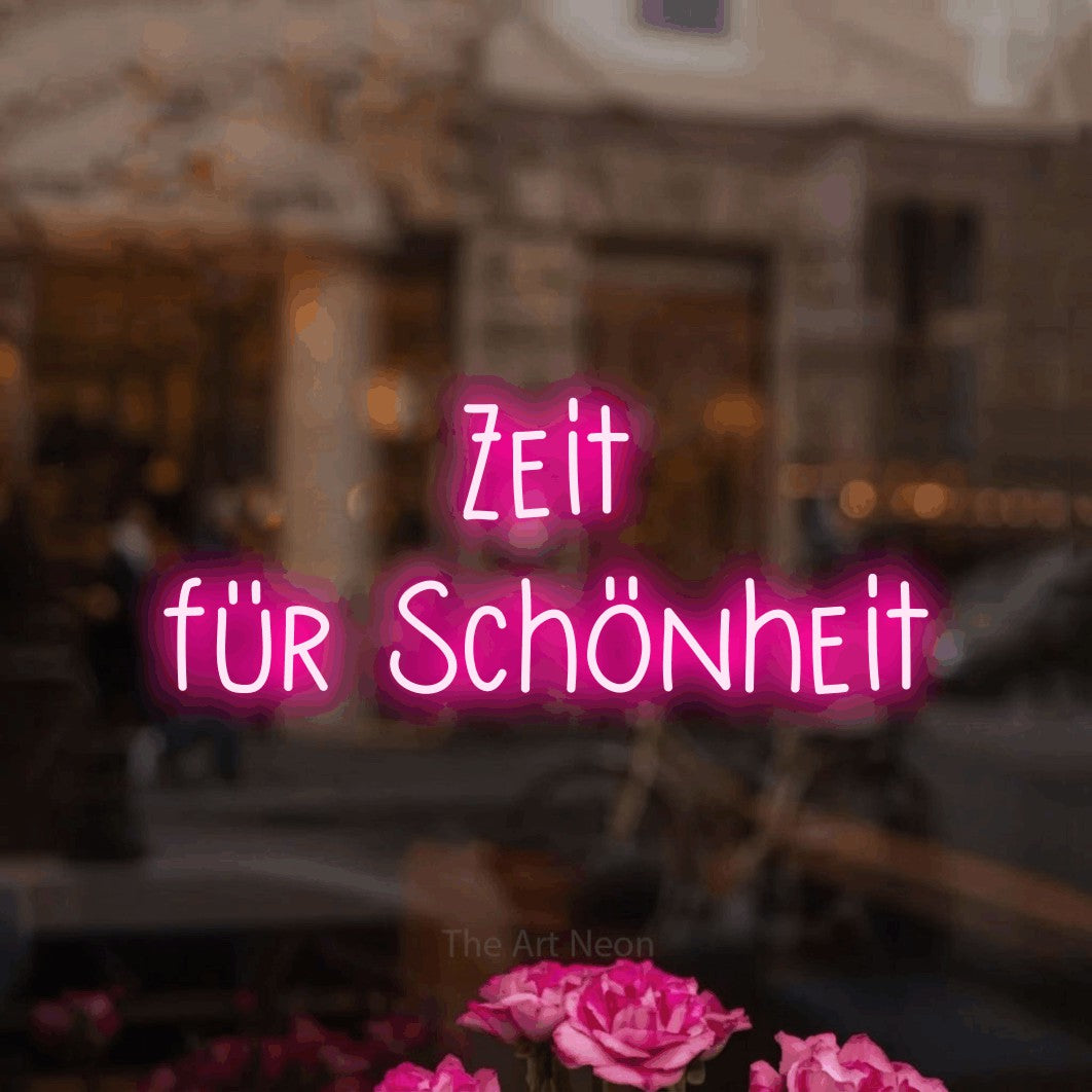 LED neon sign reading “Zeit für Schönheit”, arranged in 2 lines.