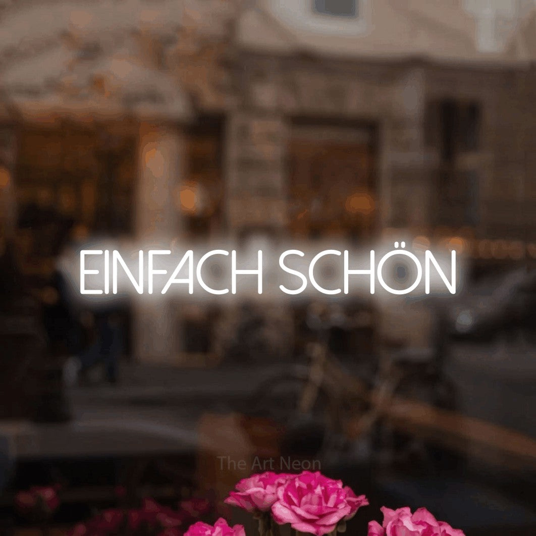 LED neon sign reading “Einfach schön”, arranged in a single line.