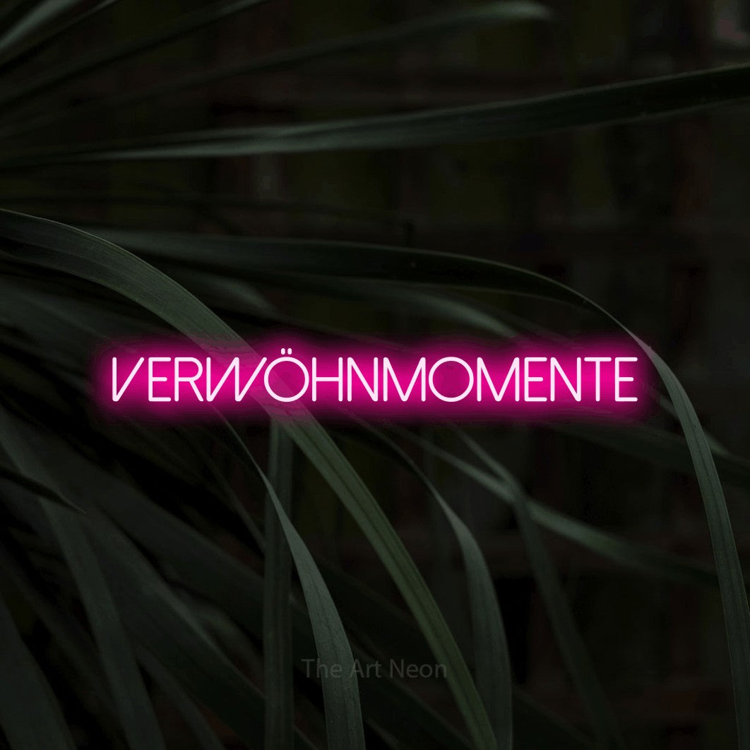 LED neon sign reading “VERWÖHNMOMENTE”, arranged in a single line.