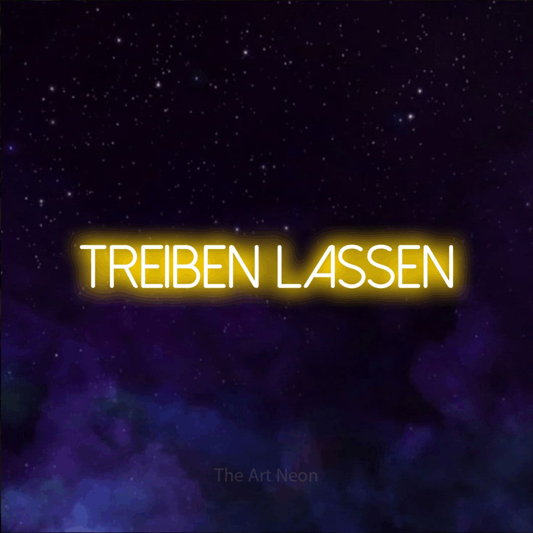 LED neon sign reading “treiben lassen”, arranged in a single line.