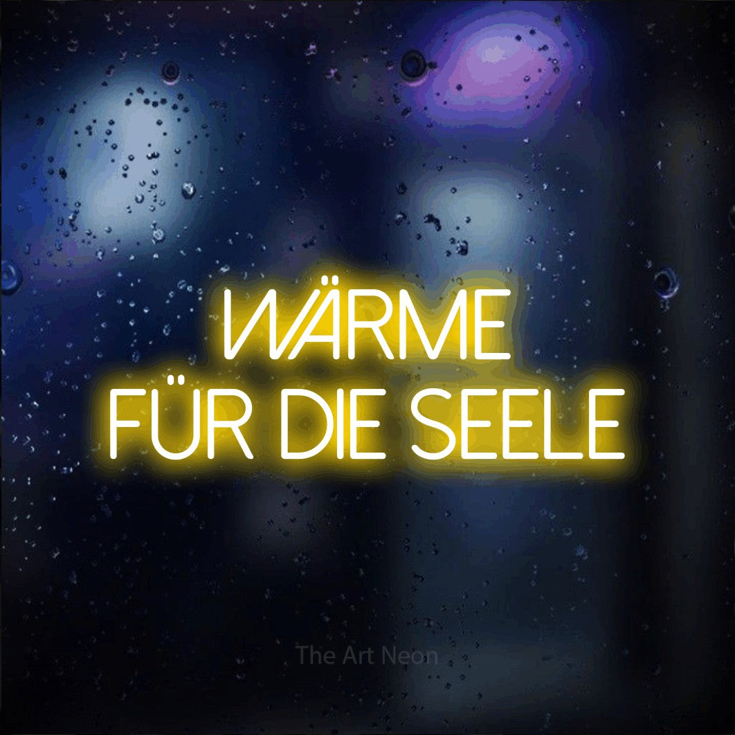 LED neon sign reading “WÄRME für die Seele”, arranged in 2 lines.