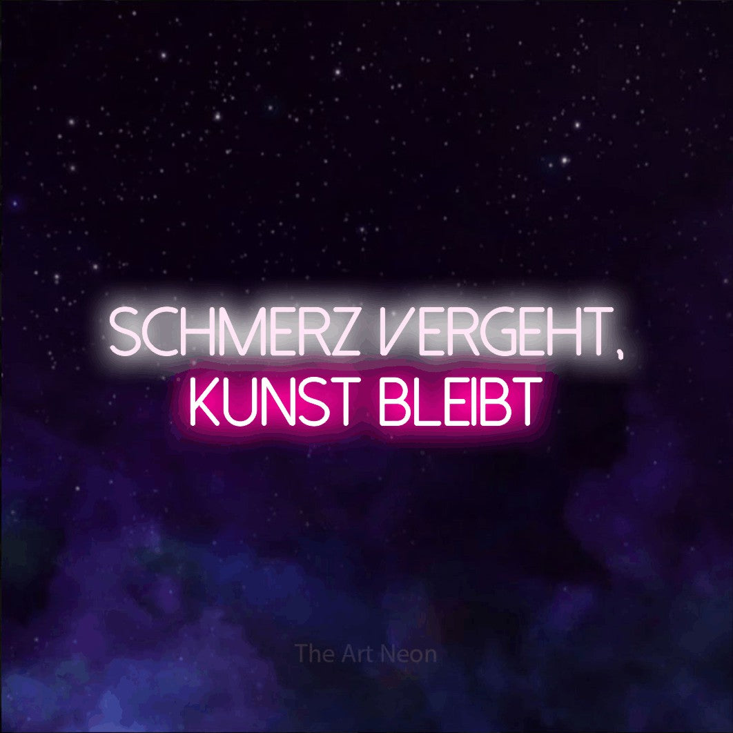 LED neon sign reading “schmerz vergeht, kunst bleibt”, arranged in 2 lines.