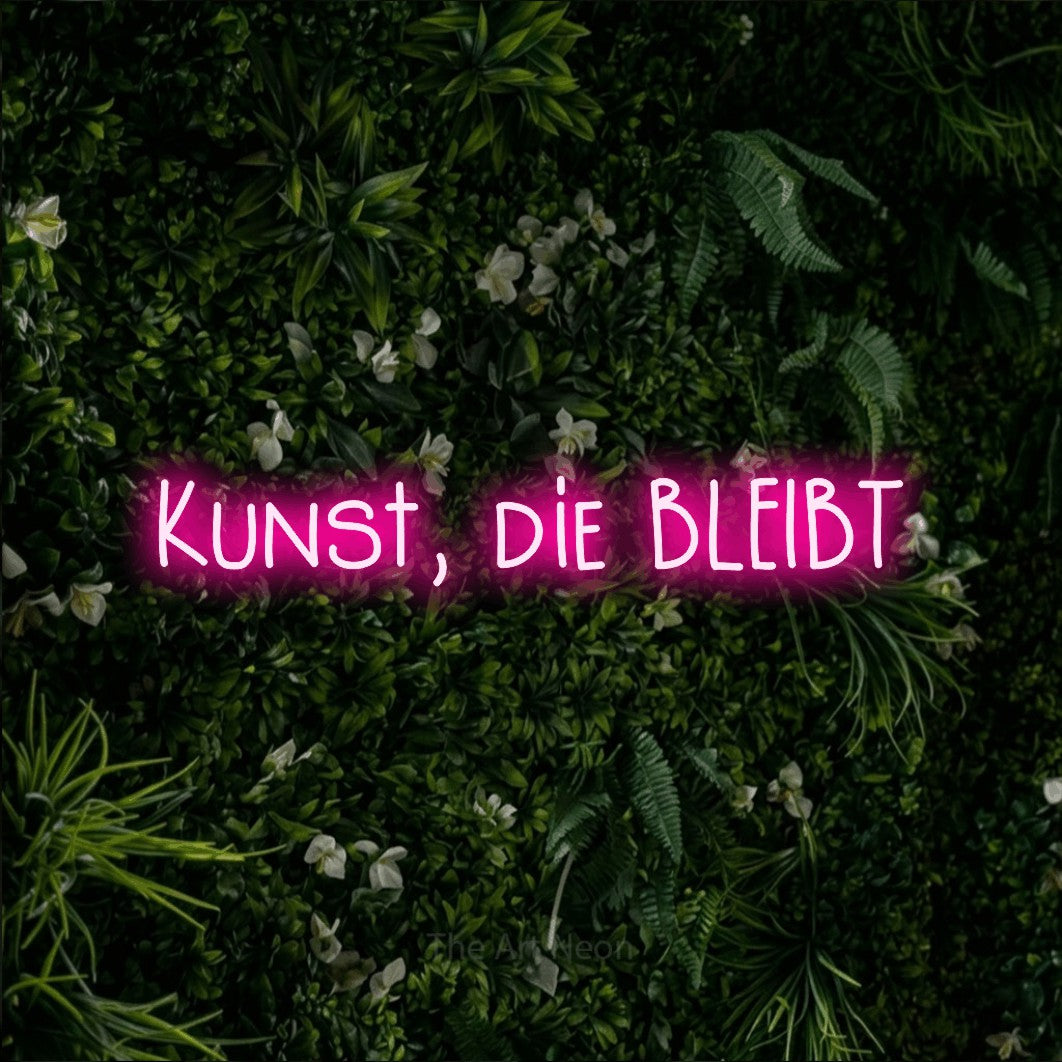 LED neon sign reading “Kunst, die BLEIBT”, arranged in a single line.