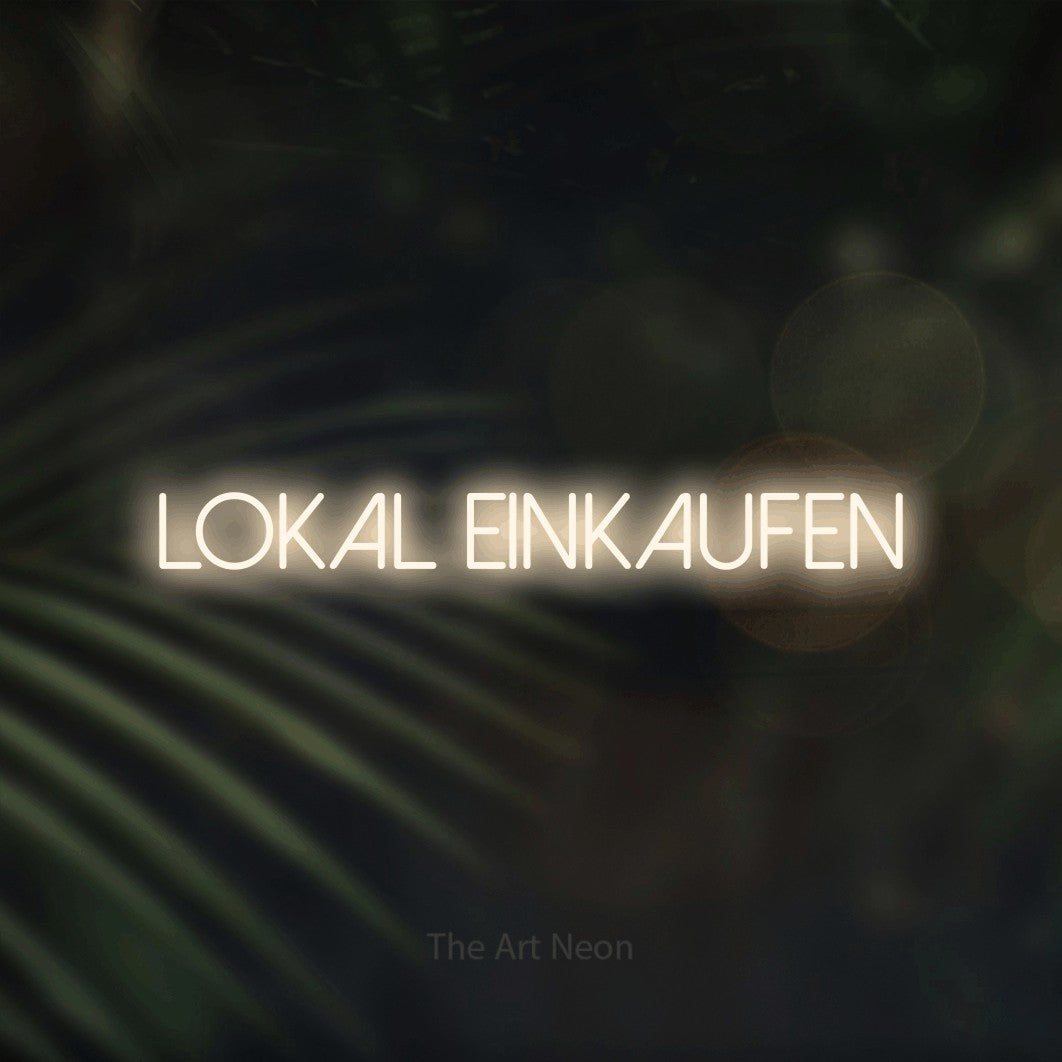 LED neon sign reading “Lokal einkaufen”, arranged in a single line.