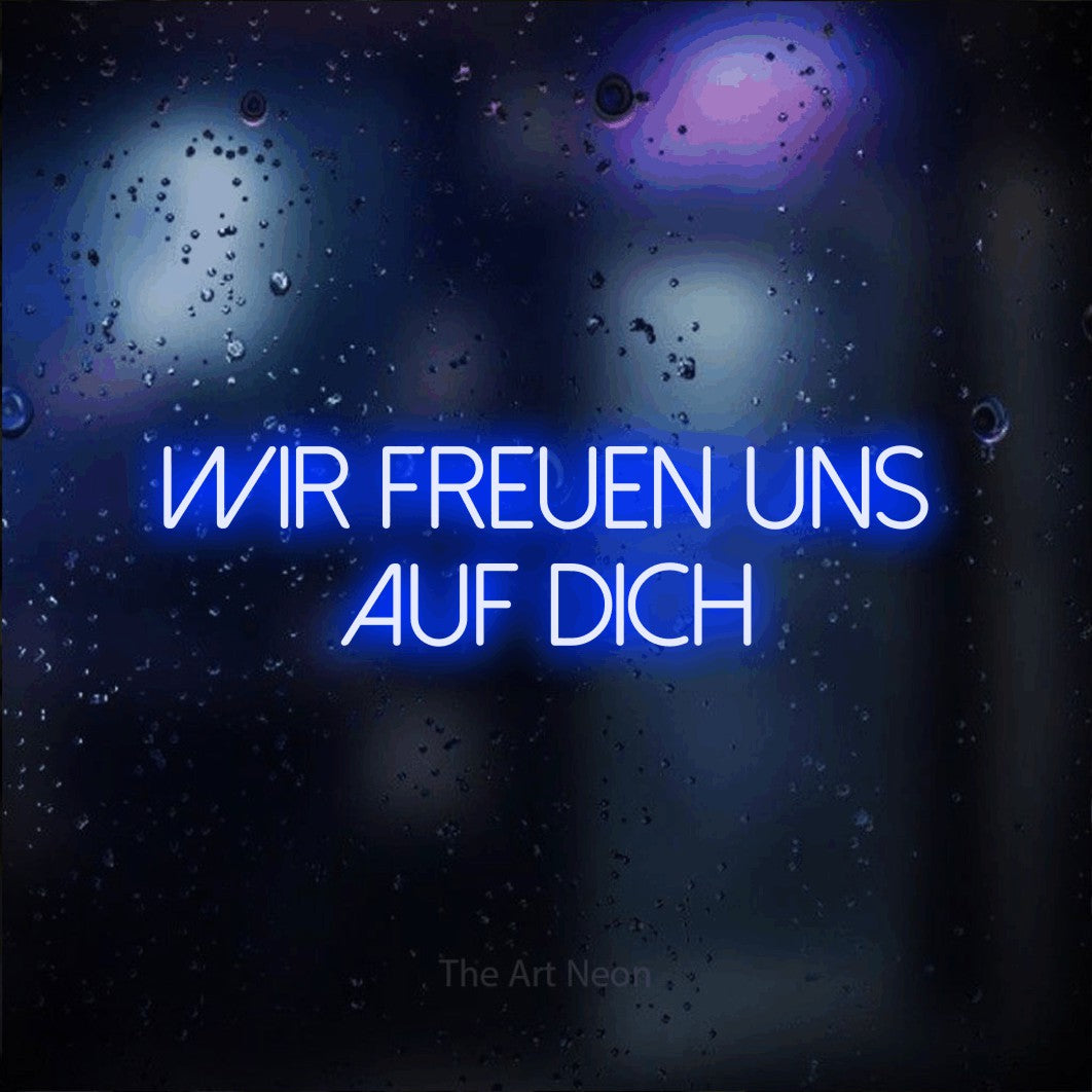 LED neon sign reading “Wir freuen uns auf dich”, arranged in 2 lines.