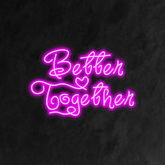 "Better Together Neon Sign" - A heartwarming neon light featuring a message of unity and togetherness, infusing an atmosphere of connection and shared joy into your living space.