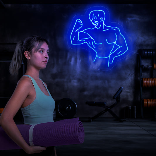 "Bodybuilder Neon Sign" - A powerful neon light featuring the silhouette of a muscular bodybuilder, infusing strength and determination into your gym or fitness space.