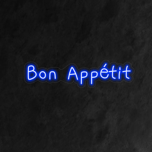 "Bon Appétit Neon Sign" - A charming neon light featuring the words "Bon Appétit," infusing culinary delight and a welcoming ambiance into your kitchen or dining area.