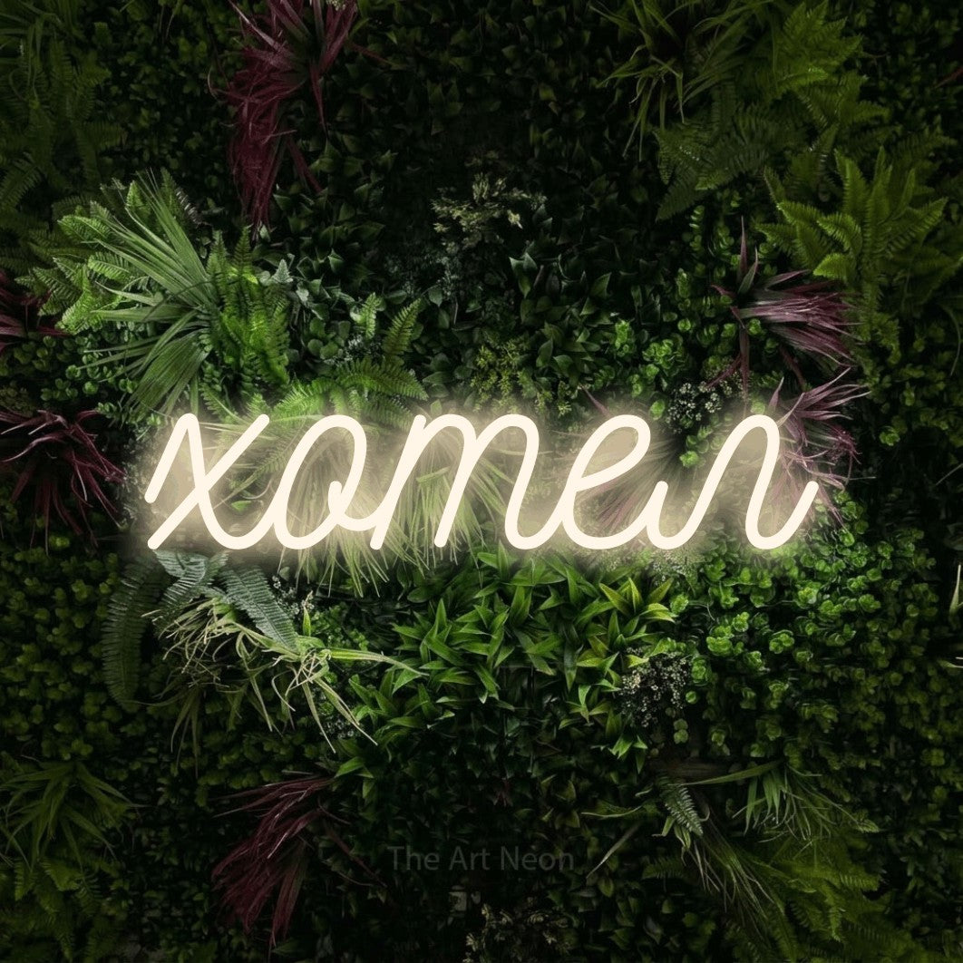LED neon sign reading “хотел”, arranged in a single line.