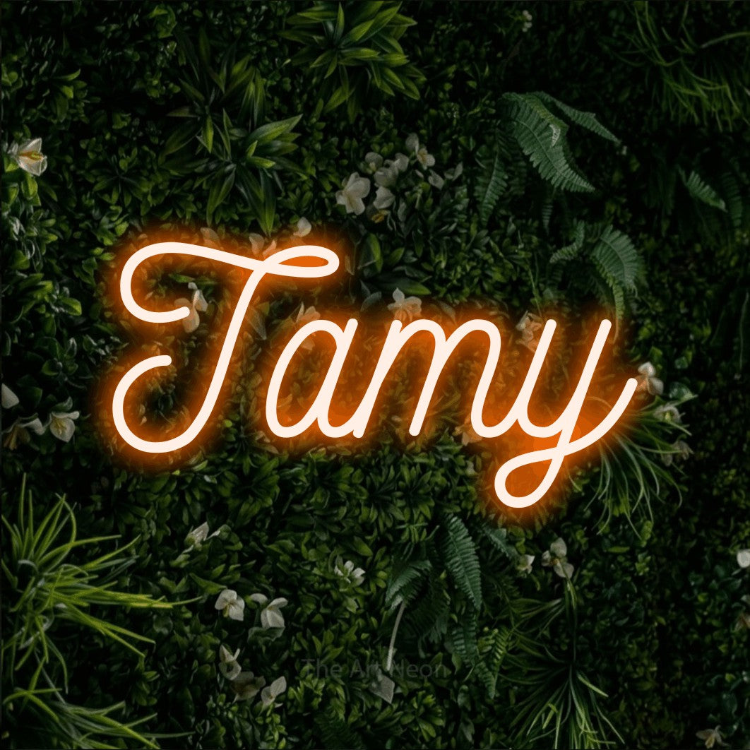 LED neon sign reading “Тату”, arranged in a single line.