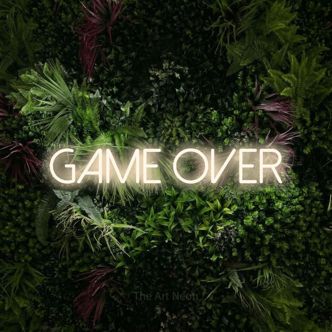 LED neon sign reading “GAME OVER”, arranged in a single line.