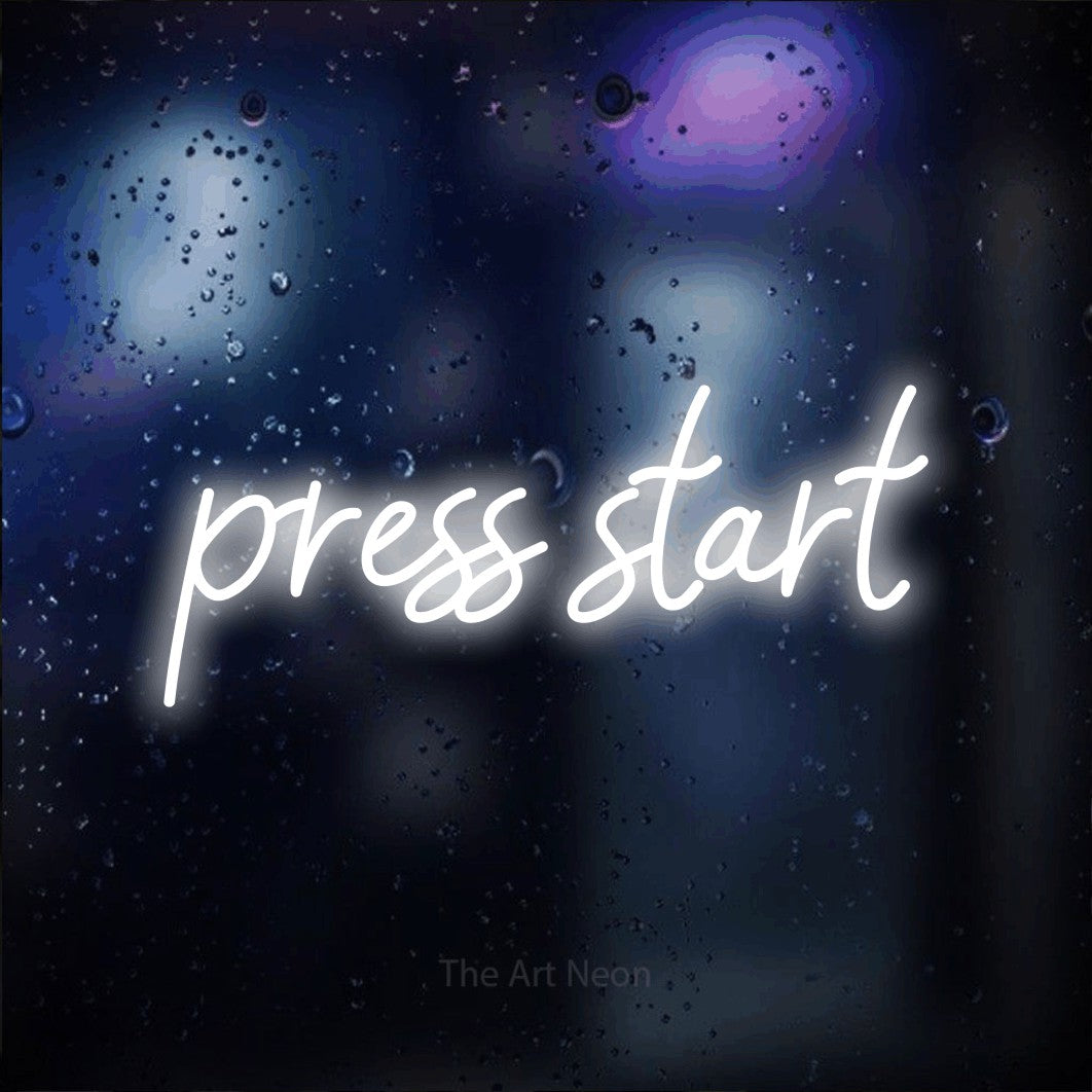 LED neon sign reading “press start”, arranged in a single line.