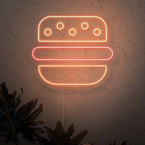 „Burger Neon Sign” este un plus clasic și apetisant pentru interiorul restaurantului tău. O lumină de neon care prezintă simbolul iconic al unui burger delicios.