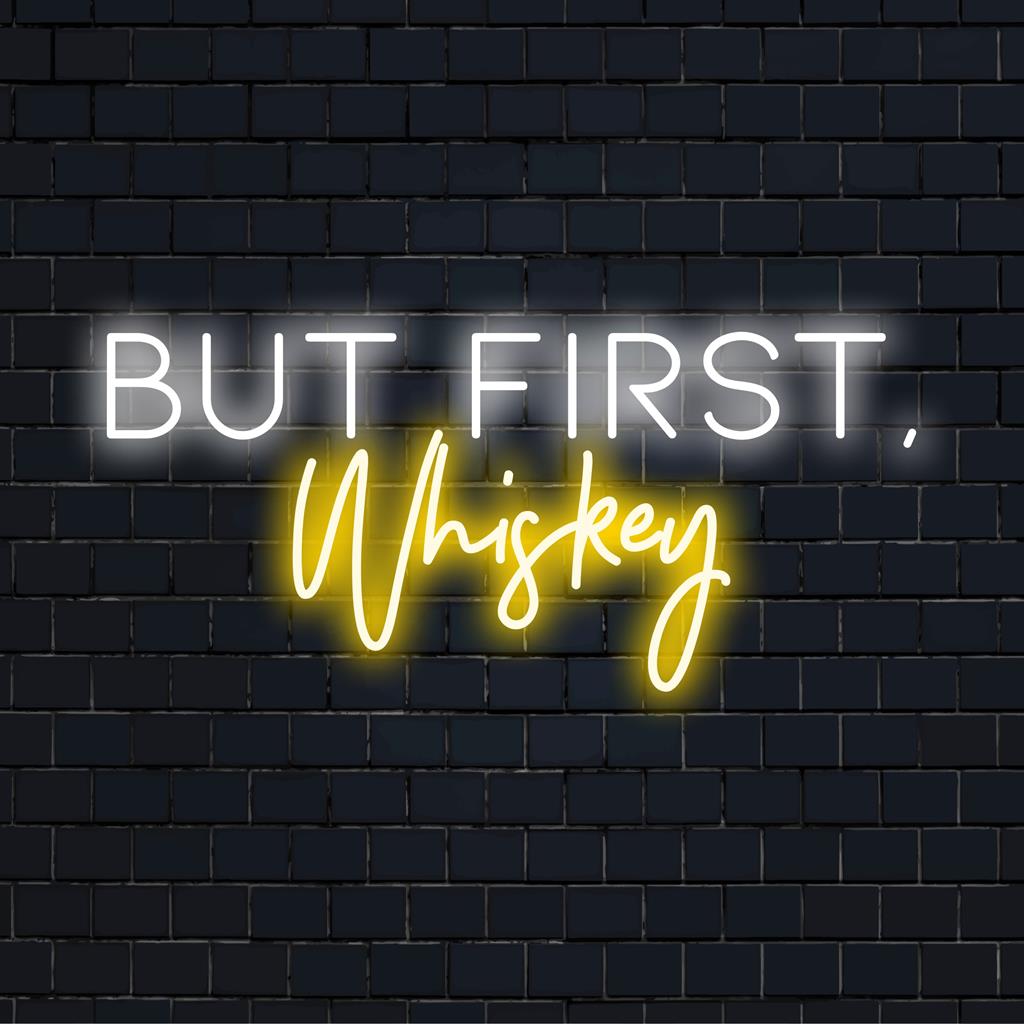 Custom LED neon sign featuring the phrase But First Whiskey in bright, bold neon lettering for striking wall decor.