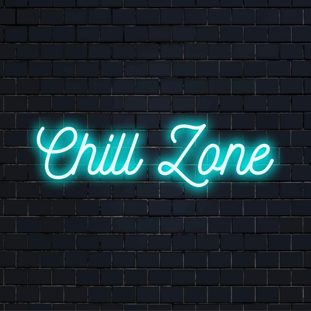 Custom neon sign glowing Chill Zone, adding a relaxed ambiance to any space with vibrant LED art.