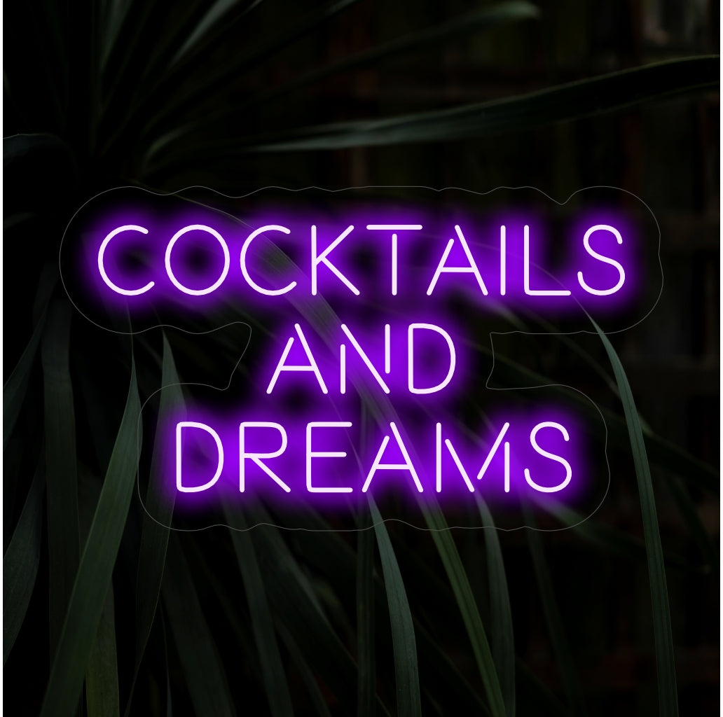 Enseigne au néon « Cocktails And Dreams » ��� Une lumière au néon tendance et pleine d'entrain affichant les mots « Cocktails And Dreams », insufflant à votre bar ou espace de divertissement une ambiance élégante et amusante.
